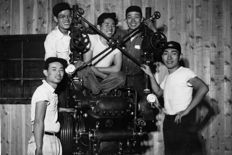 mayekawa mycom workers with a high speed compressor